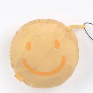 Yellow Smile Raincoat in a bag poncho NWT